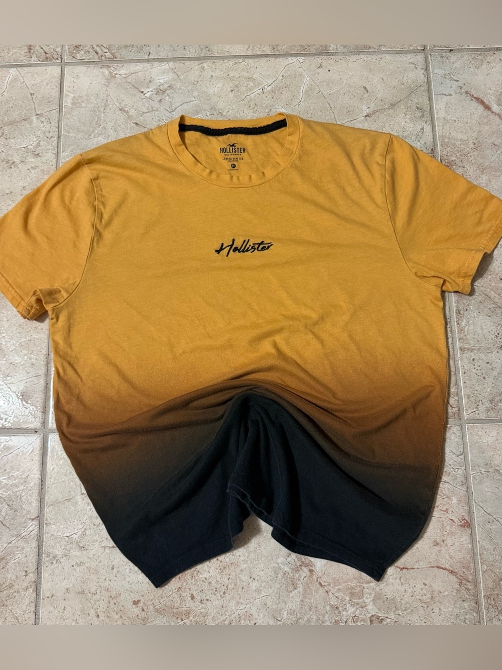 Hollister Co. curved hem yellow to black gradient cotton t-shirt in size M.